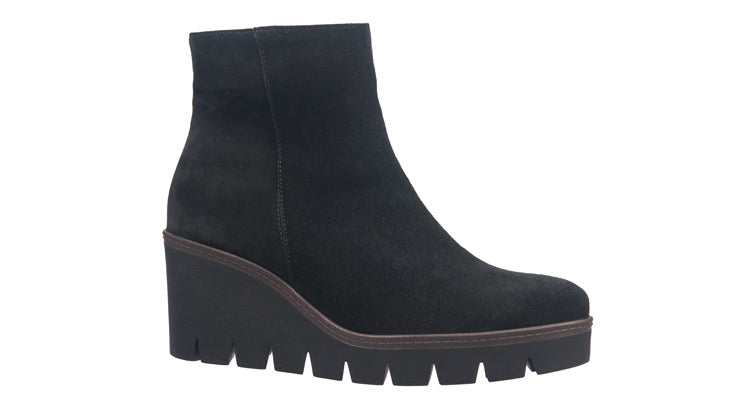 Ladies black suede boots with a mid height wedge heel. 