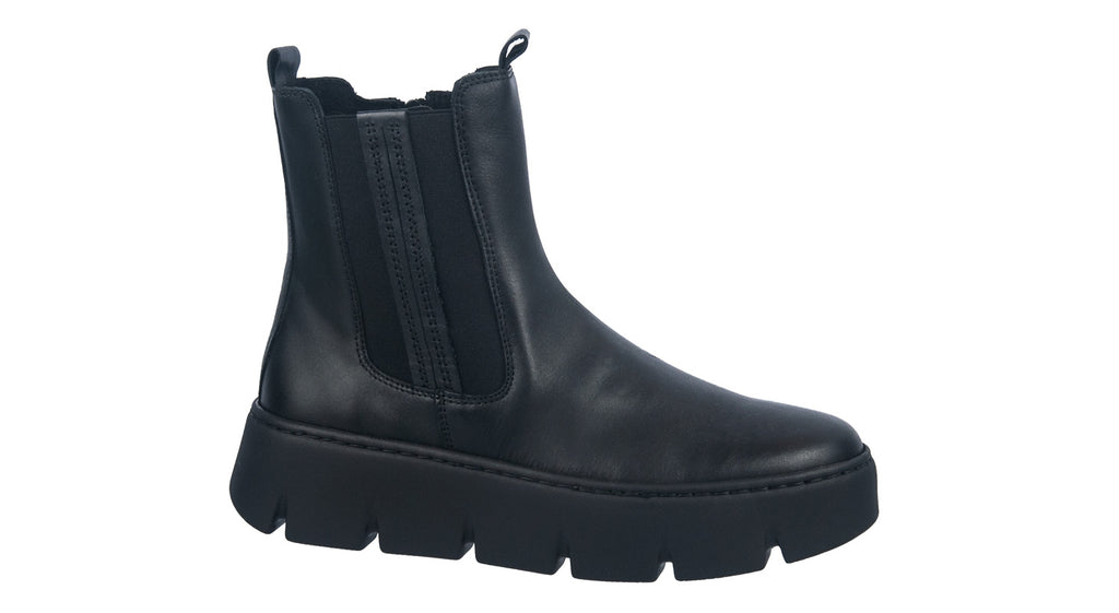 Black leather wedge boots with a chunky sole.
