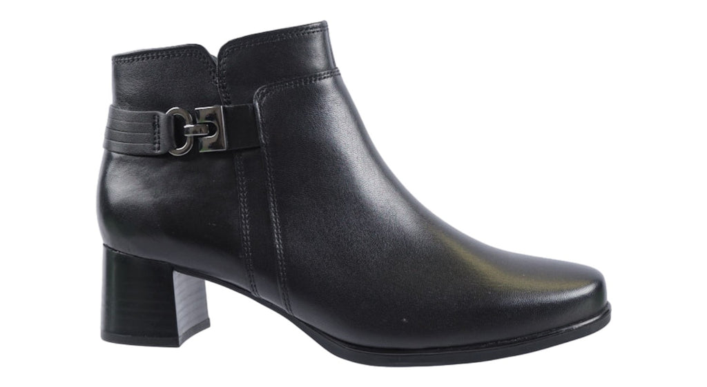 Black leather ankle boots with buckle detail. Mid height heels.