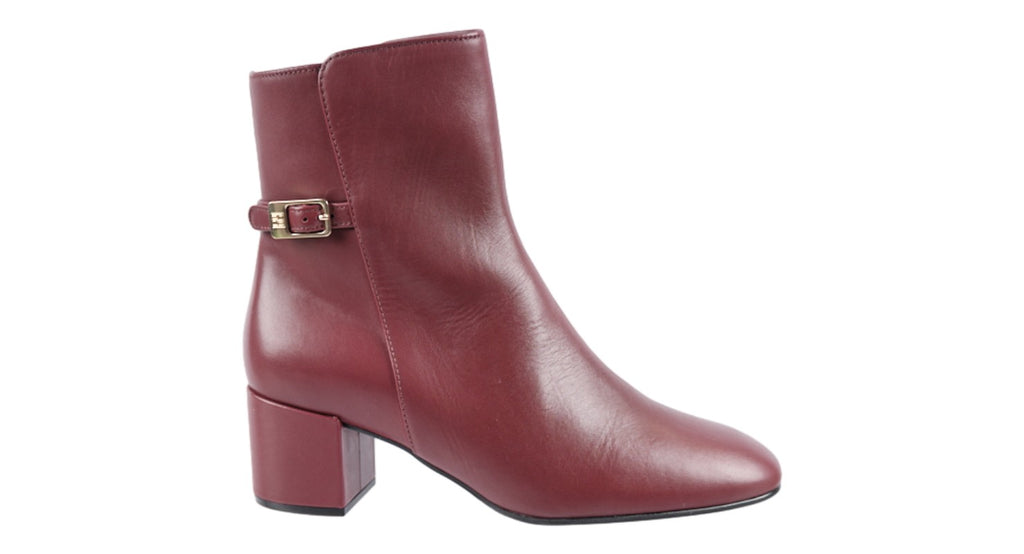 Wine leather heeled ankle boot with buckle detailing. 50mm heel.