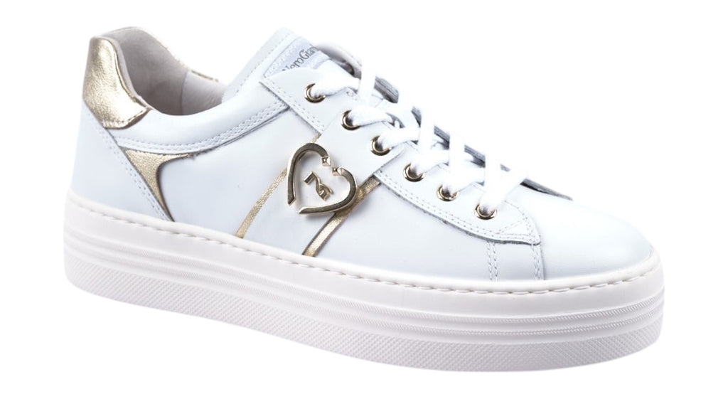 White leather trainer with gold details