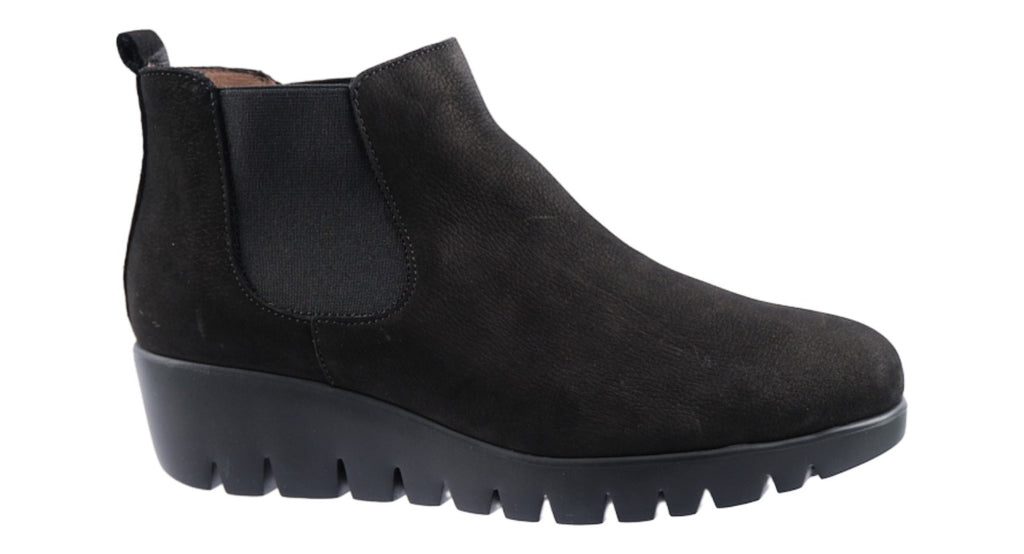 Comfy black suede boot with two elastic side gussets on a super light weight wedge sole.